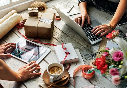 Wisitech portfolio: Image representing Etsy seller services, showing hands preparing handcrafted goods for shipping, demonstrating marketplace optimization.