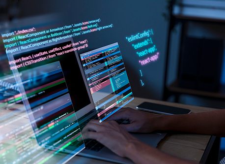 Enterprise website development showing developer coding complex enterprise web application on laptop