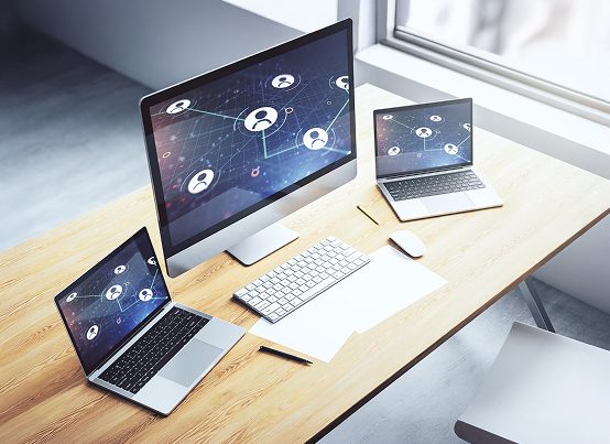 Medical research organization intranet platform showing connected user network across multiple devices