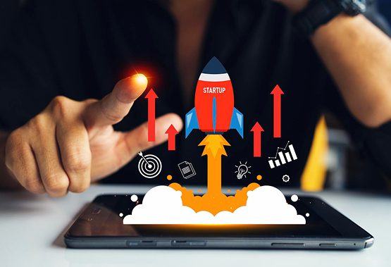 MVP development services illustration showing startup launch, rocket growth, and product validation on tablet screen