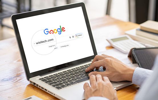 WooCommerce development company Witsteck showcasing website on laptop