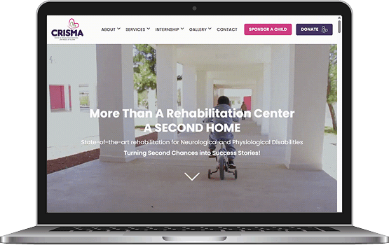 A laptop displaying the improved CRISMA website on the screen, highlighting the functional and visual success of the digital marketing project.